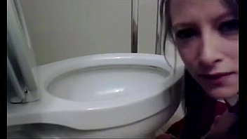 girl licking airplane toilet