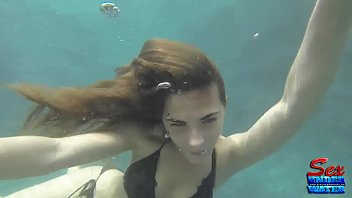 brunette kristy stripping underwater