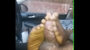 ebony footjob in car