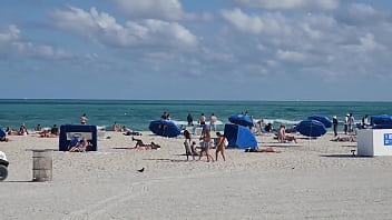 public beach rubbing