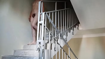 nun at stairs