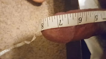 women measuring penis